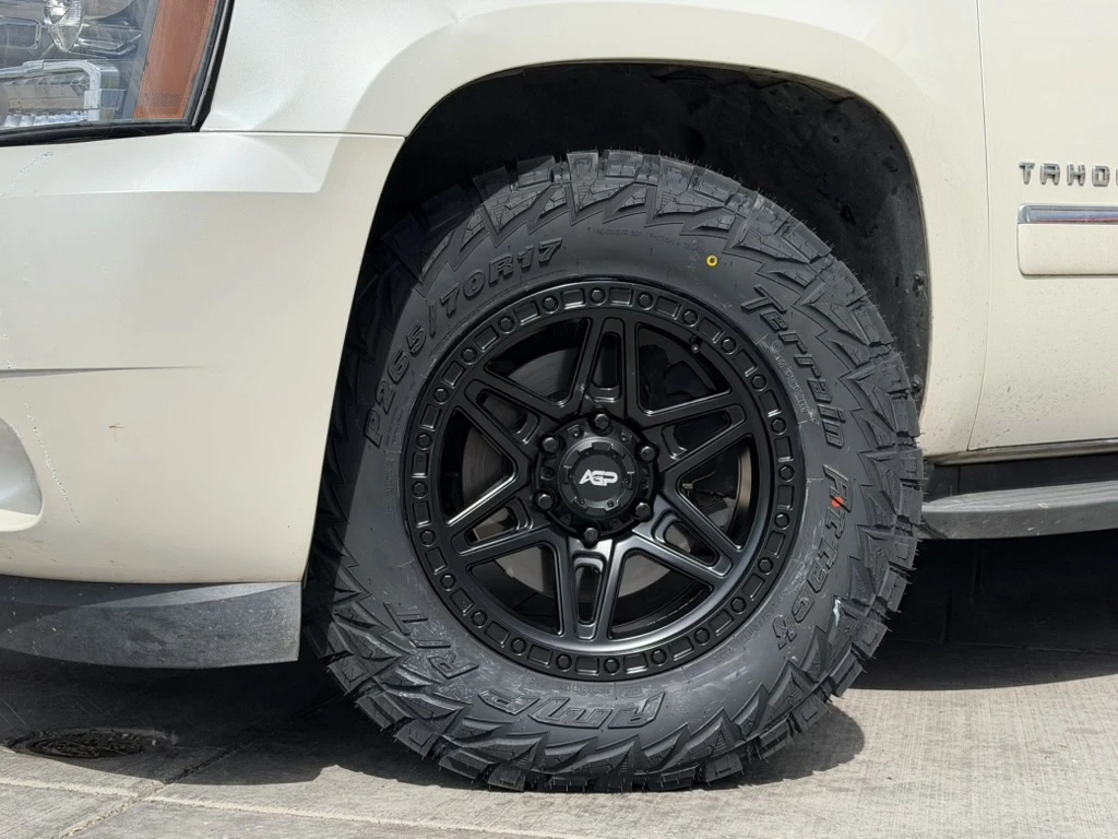 2012 Chevrolet Tahoe with AGP 307 Black Rims