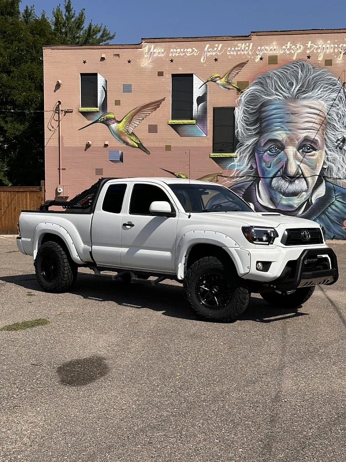 Black AGP 307 Rim on 2015 Toyota Tacoma