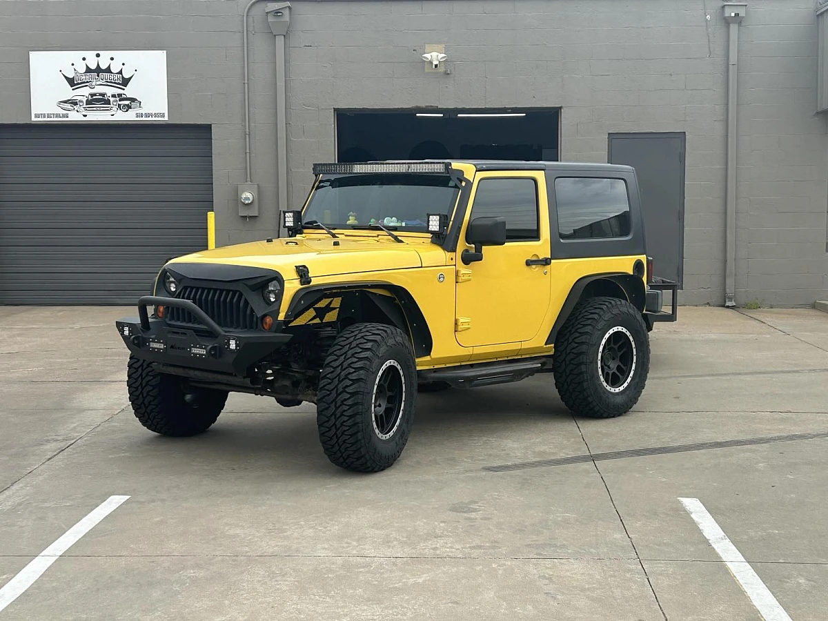 2016 Jeep Wrangler with AGP TRUX Black and Polished Wheels