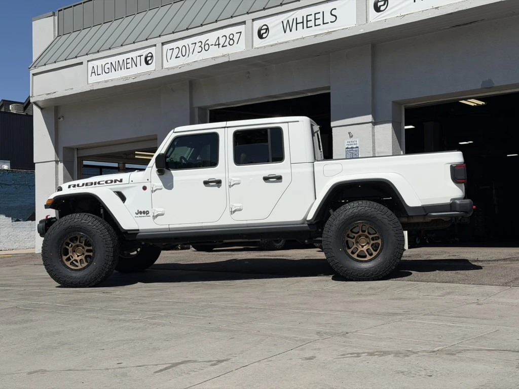 2025 Jeep Gladiator with AGP TRUX Bronze Rims