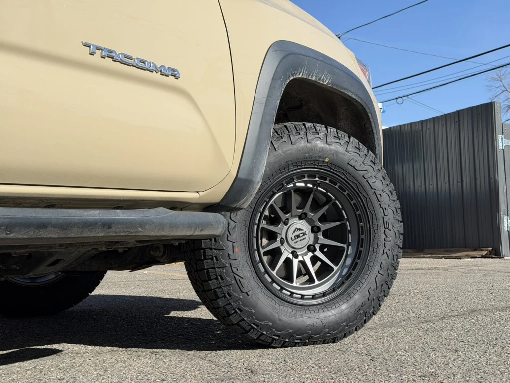 2023 Toyota Tacoma with Lock Off-Road Baja Charcoal Rims