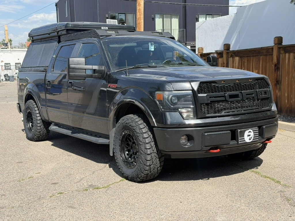 2012 Ford F-150 with Lock Off-Road Combat Black Rims