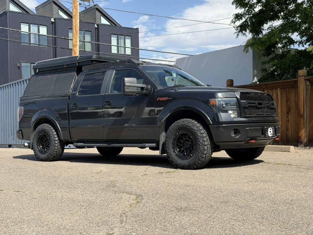 2012 Ford F-150 with Lock Off-Road Combat Black Wheels