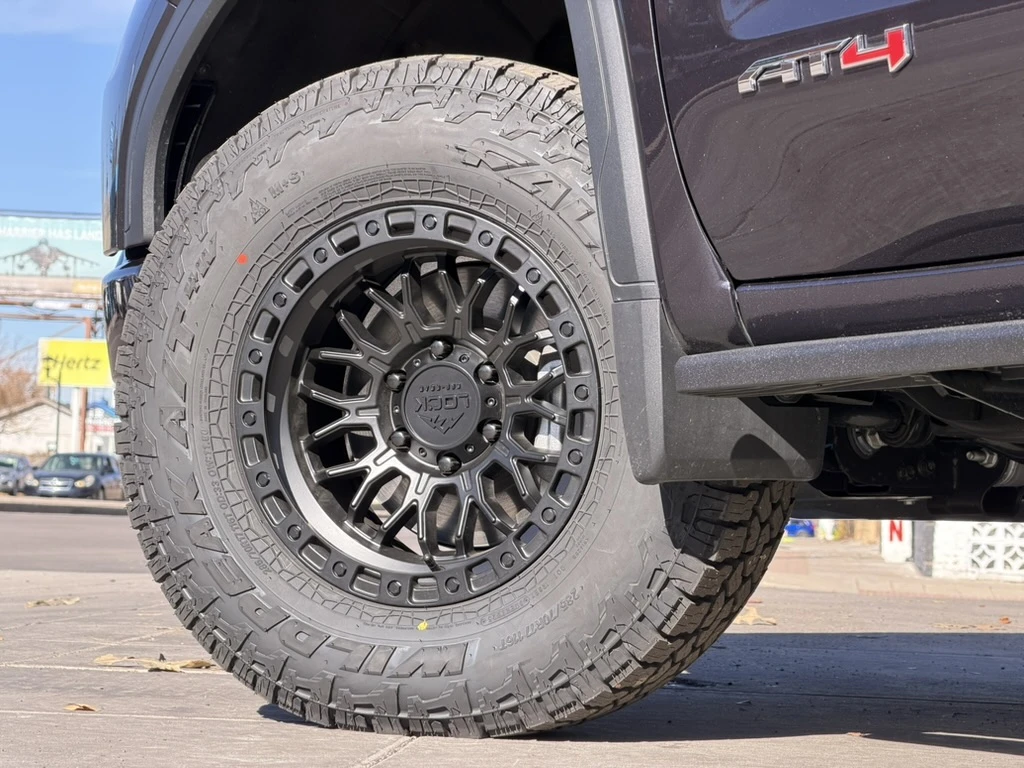 2025 GMC Sierra 1500 with Lock Off-Road Combat Black Rims