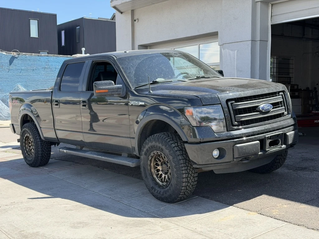 2012 Ford F-150 with Lock Off-Road Combat Bronze Wheels