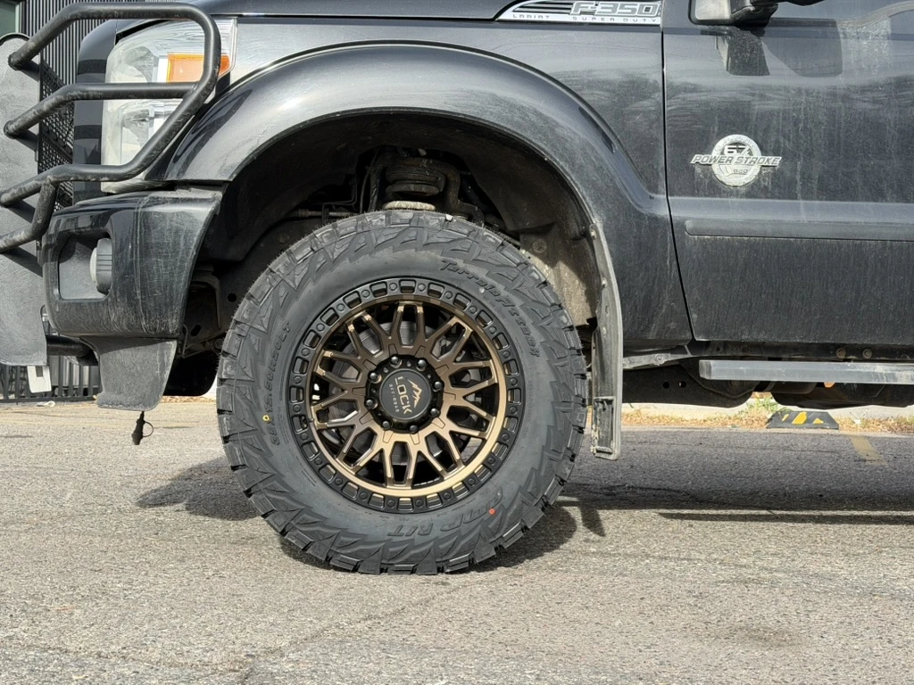 2016 Ford F-350 with Lock Off-Road Combat Bronze Rims