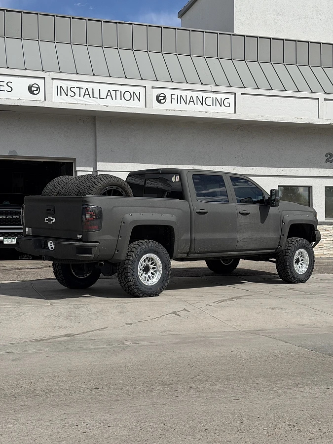 2016 Chevrolet Silverado 1500 with Lock Off-Road Combat Polished Silver Wheels
