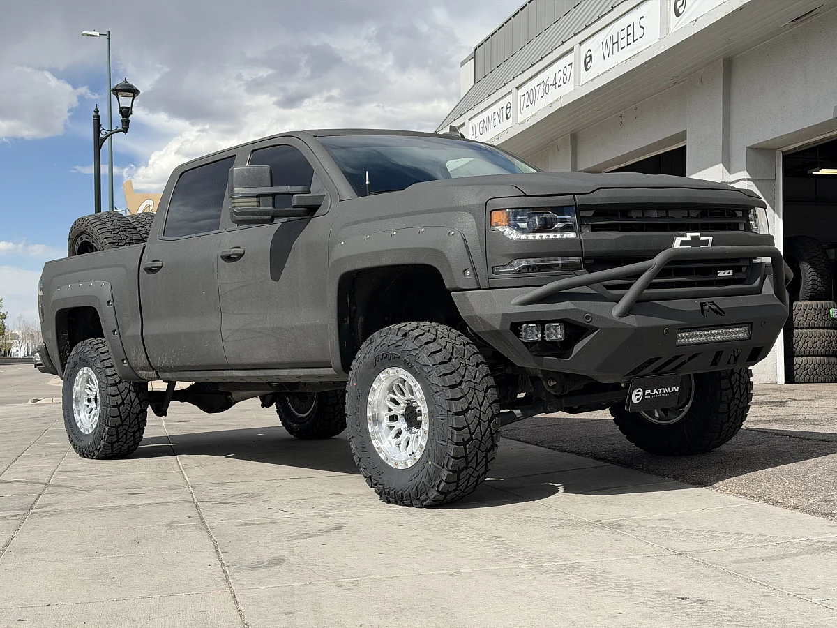 2016 Chevrolet Silverado 1500 with Polished Silver Lock Off-Road Combat Rims
