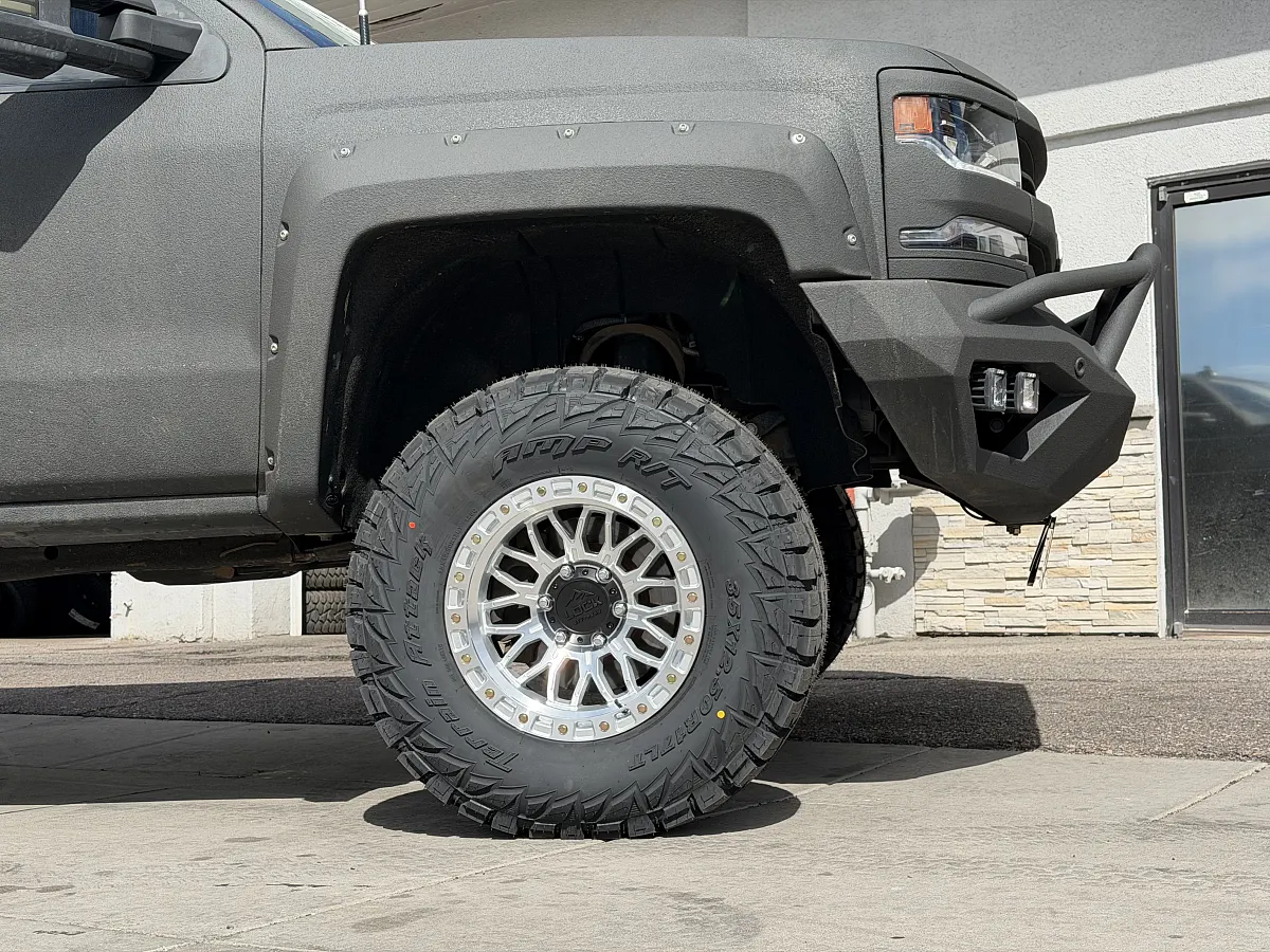 2016 Chevrolet Silverado 1500 with Lock Off-Road Combat Polished Silver Rims