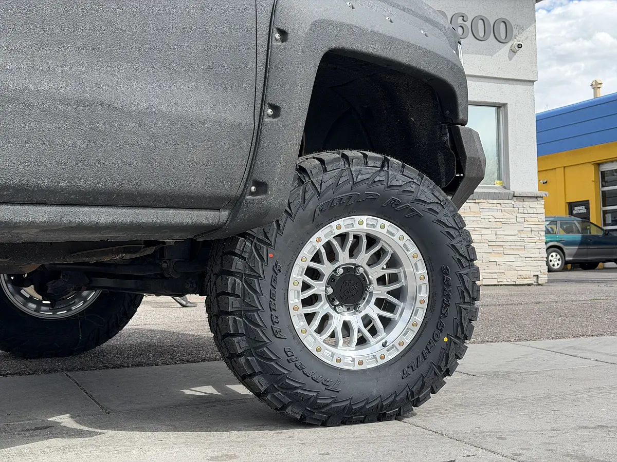 Lock Off-Road Combat Polished Silver Aftermarket Wheel on 2016 Chevrolet Silverado 1500