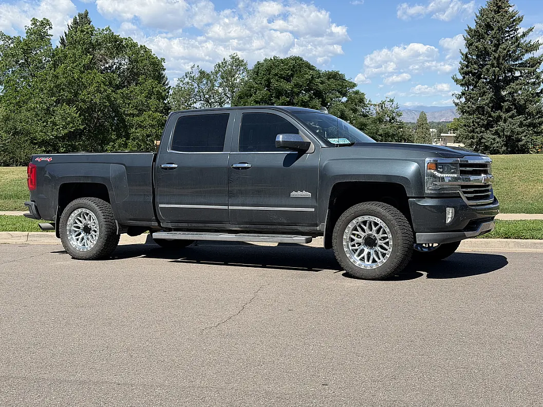 2017 Chevrolet Silverado 1500 with Lock Off-Road Combat Polished Silver Wheels
