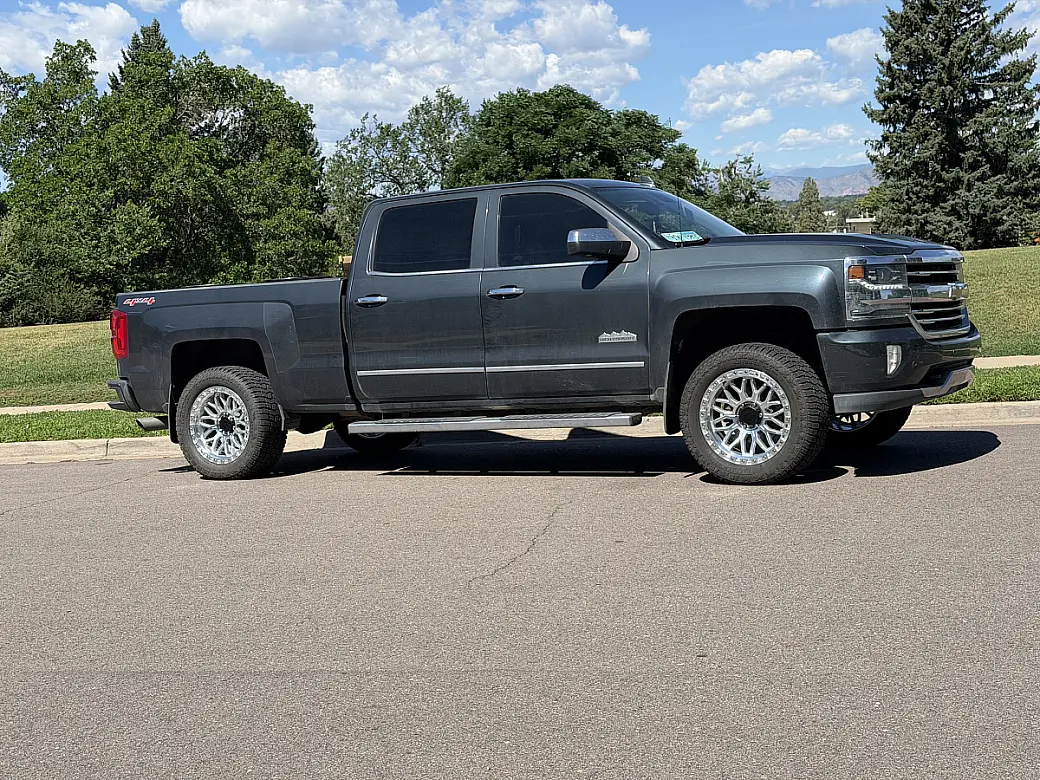 2017 Chevrolet Silverado 1500 with Polished Silver Lock Off-Road Combat Rims