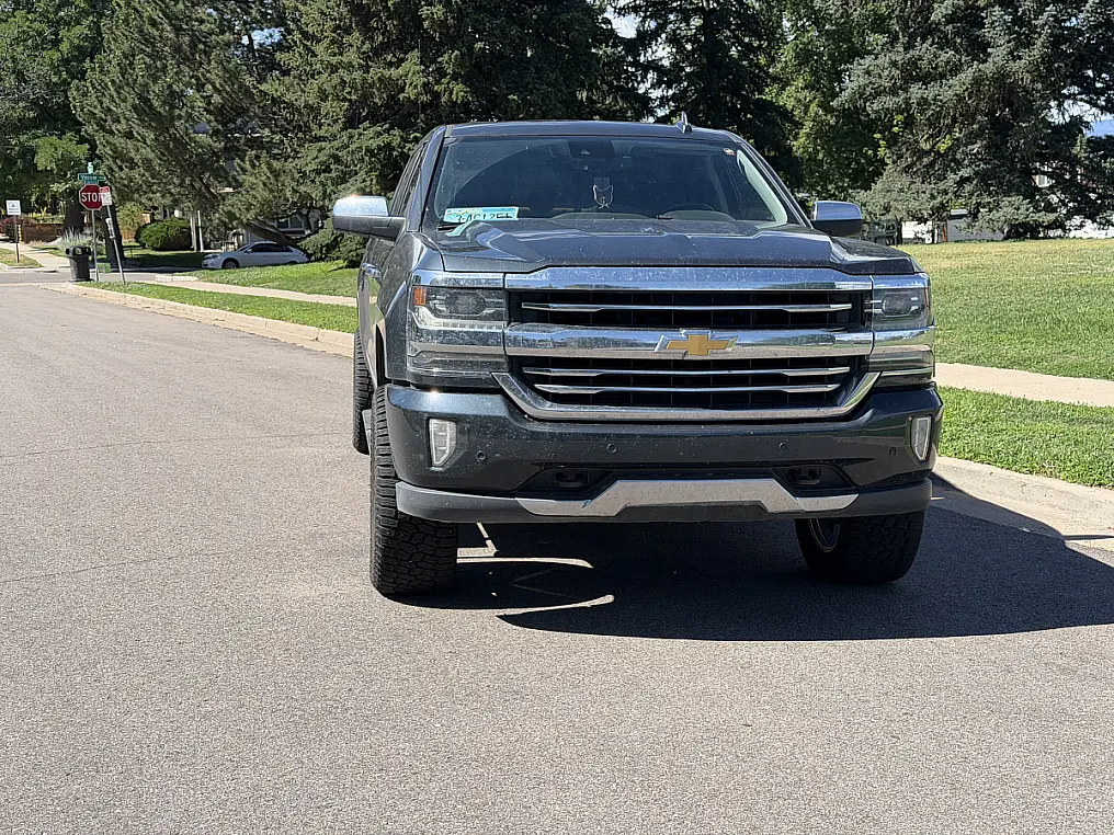 2017 Chevrolet Silverado 1500 with Lock Off-Road Combat Polished Silver Rims