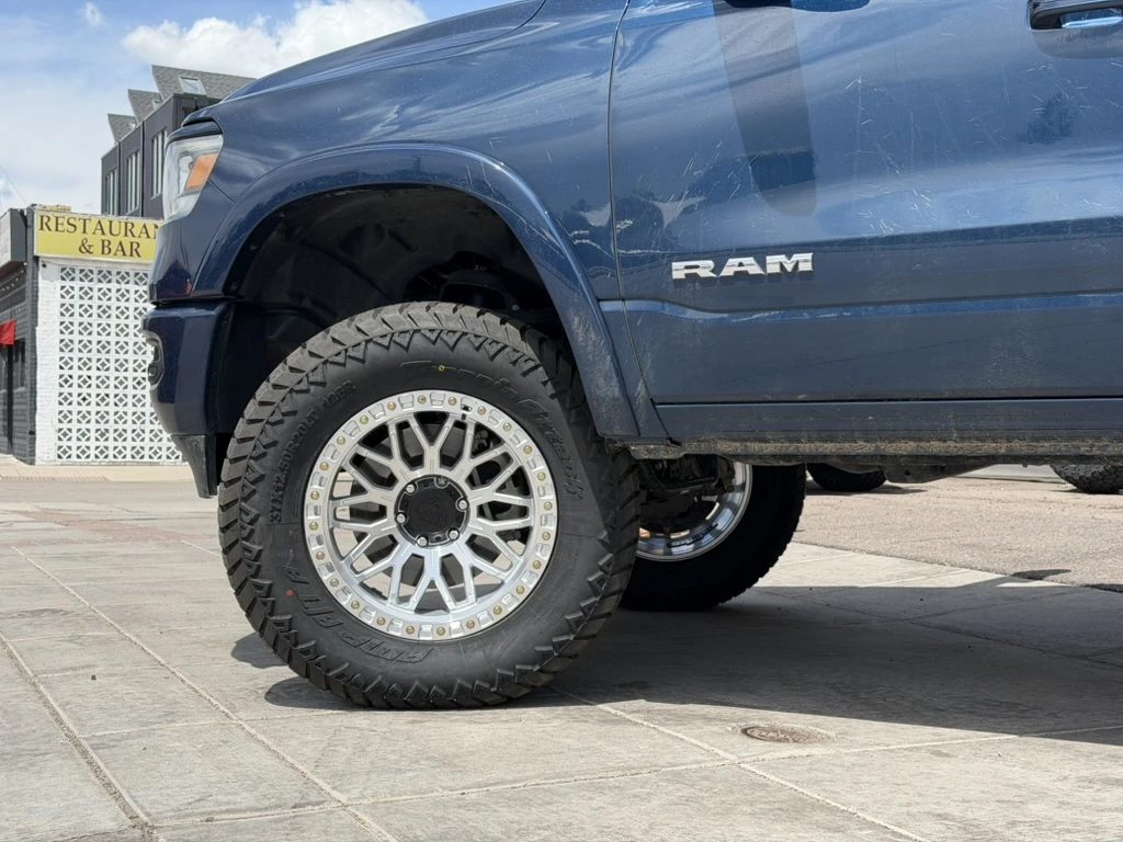 2024 RAM 1500 with Polished Silver Lock Off-Road Combat Rims