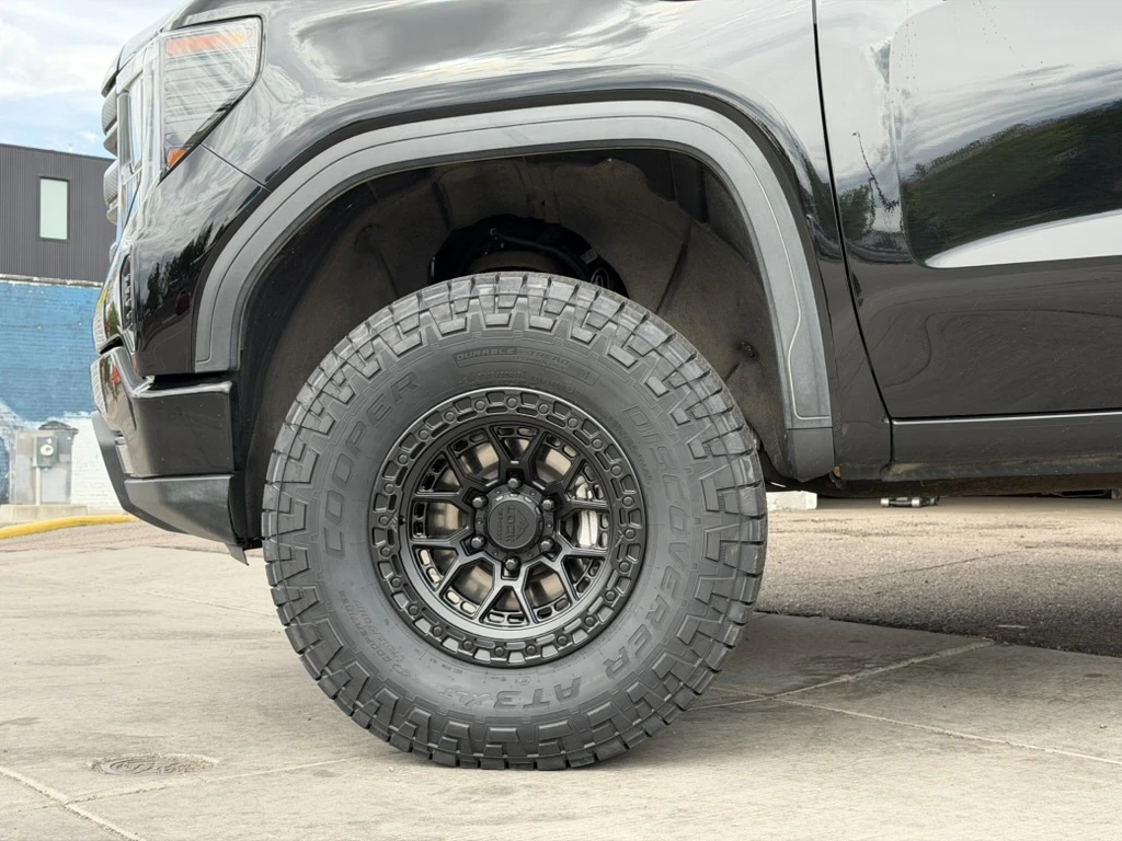 2025 GMC Sierra 1500 with Black Lock Off-Road Commando Rims
