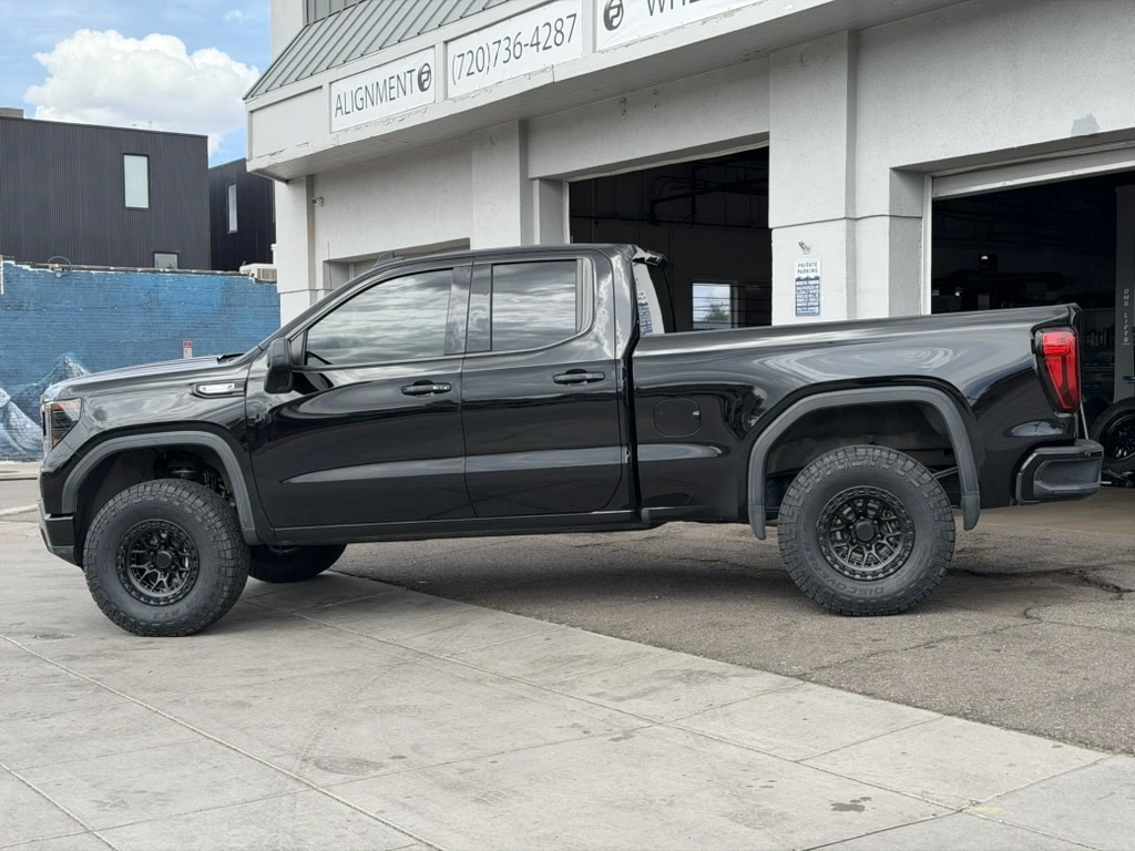 2025 GMC Sierra 1500 with Lock Off-Road Commando Black Rims