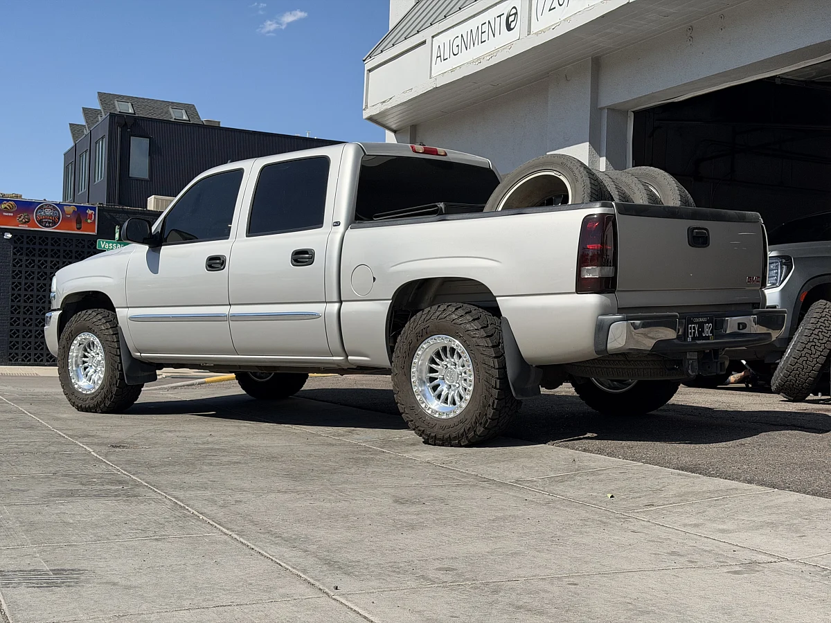 2003 GMC Sierra 1500 with Machined with Clear Coat Lock Off-Road Grit Rims