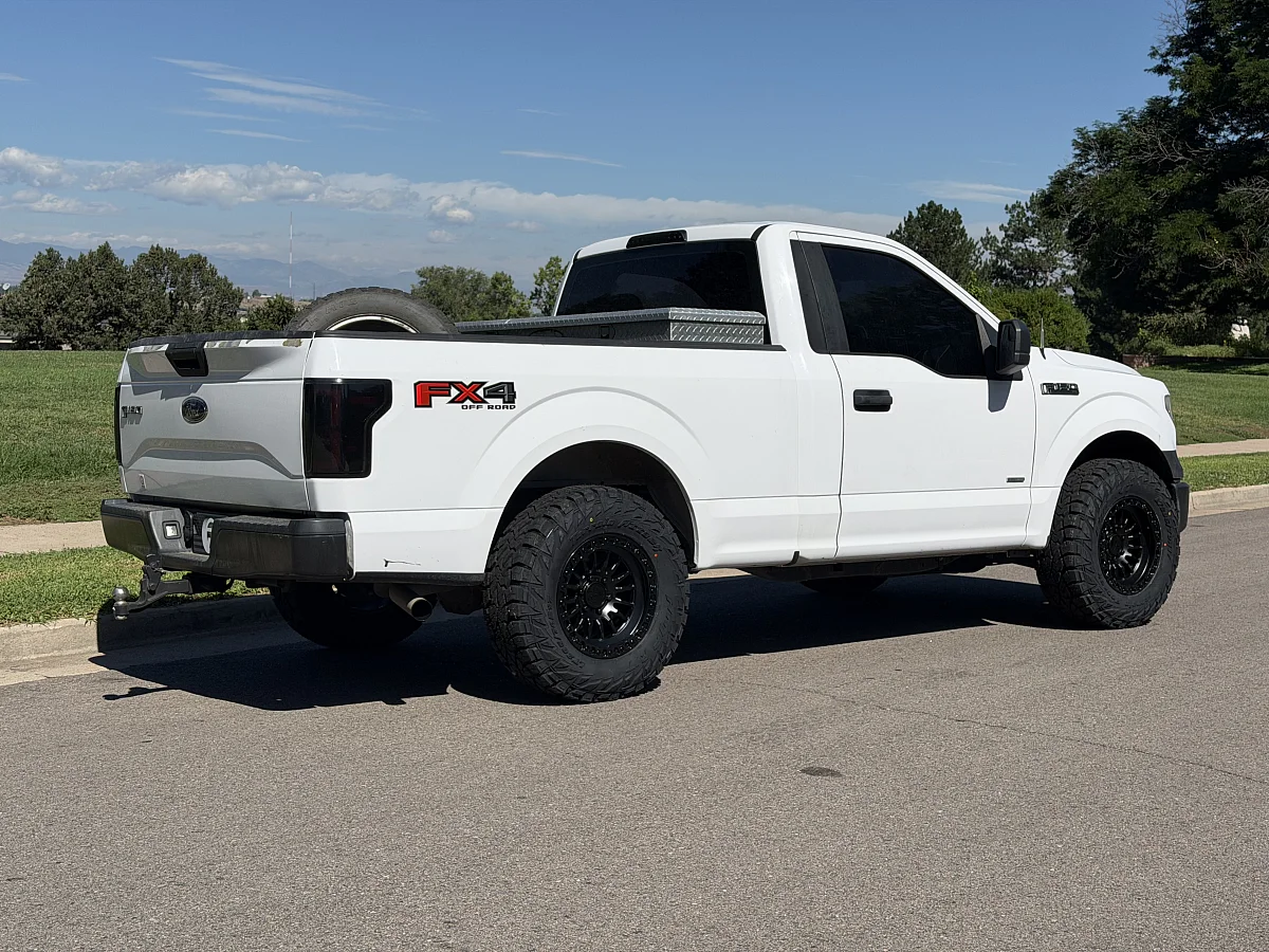 2016 Ford F-150 with Lock Off-Road Grit Matte Black w Gloss Black Ring Rims