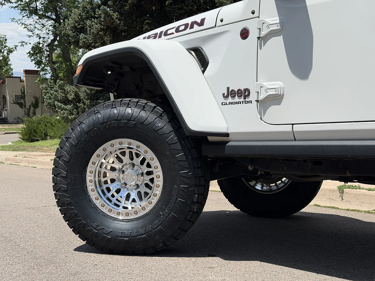 2025 Jeep Gladiator with Polished Silver Lock Off-Road Invader Rims