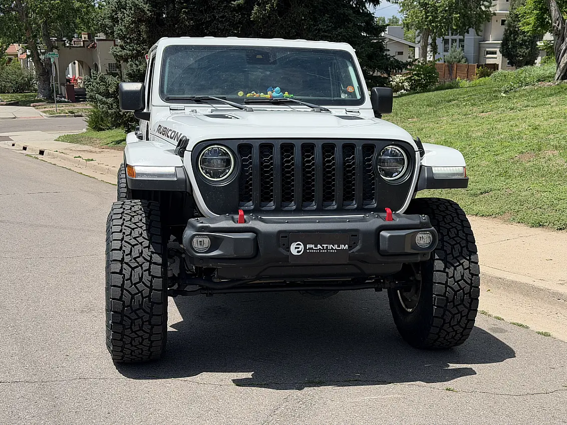 2025 Jeep Gladiator with Polished Silver Lock Off-Road Invader Wheels
