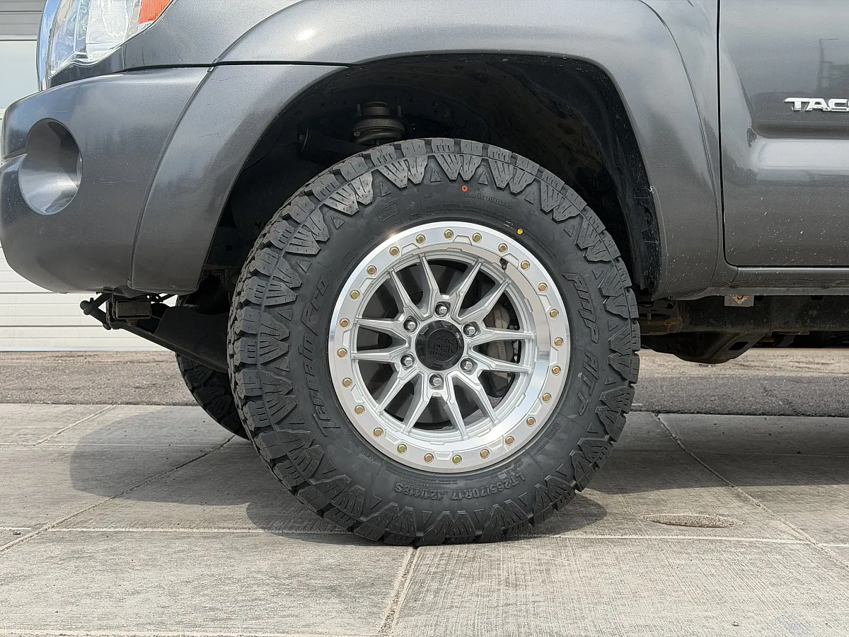 2012 Toyota Tacoma with Lock Off-Road Krawler Polished Rims