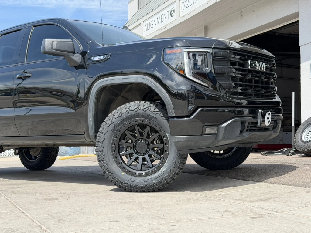 2025 GMC Sierra 1500 Fitted with Black Lock Off-Road Lunatic Rims
