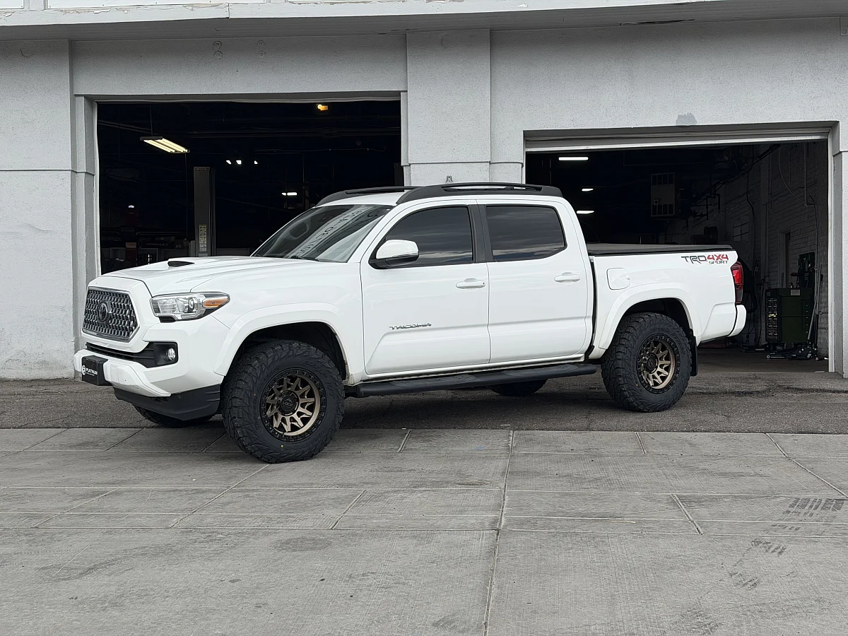 2023 Toyota Tacoma with Lock Off-Road Lunatic Bronze Rims
