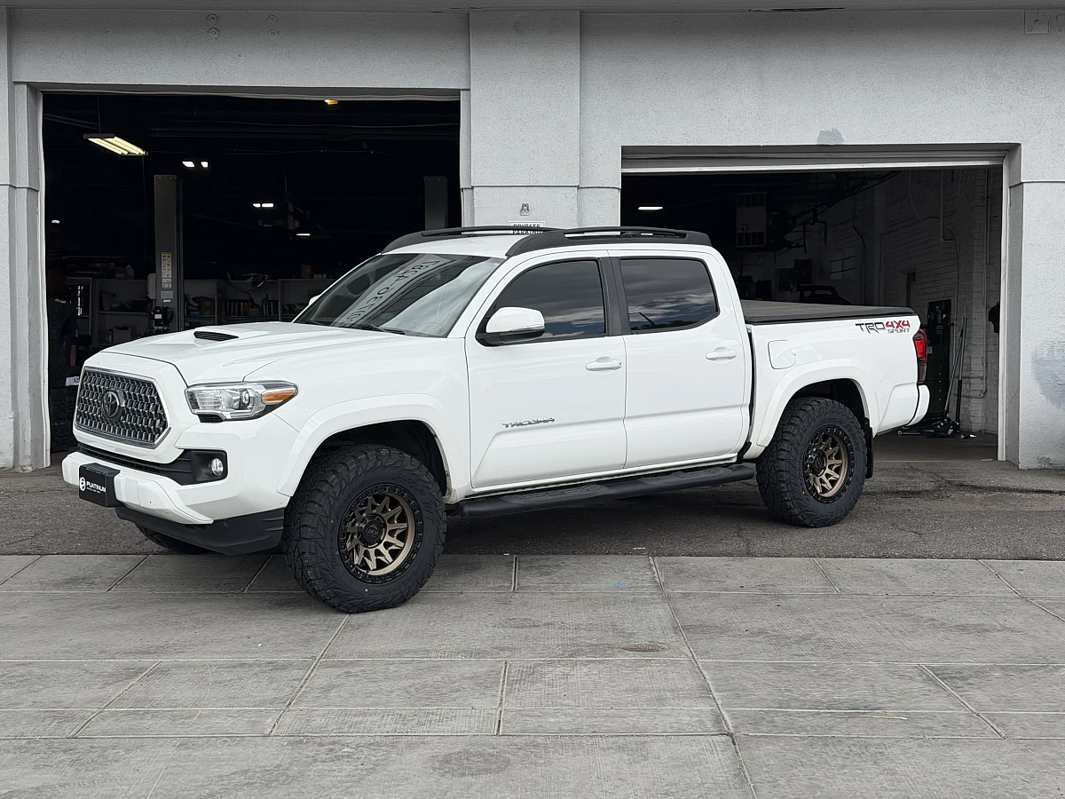 2023 Toyota Tacoma with Bronze Lock Off-Road Lunatic Rims