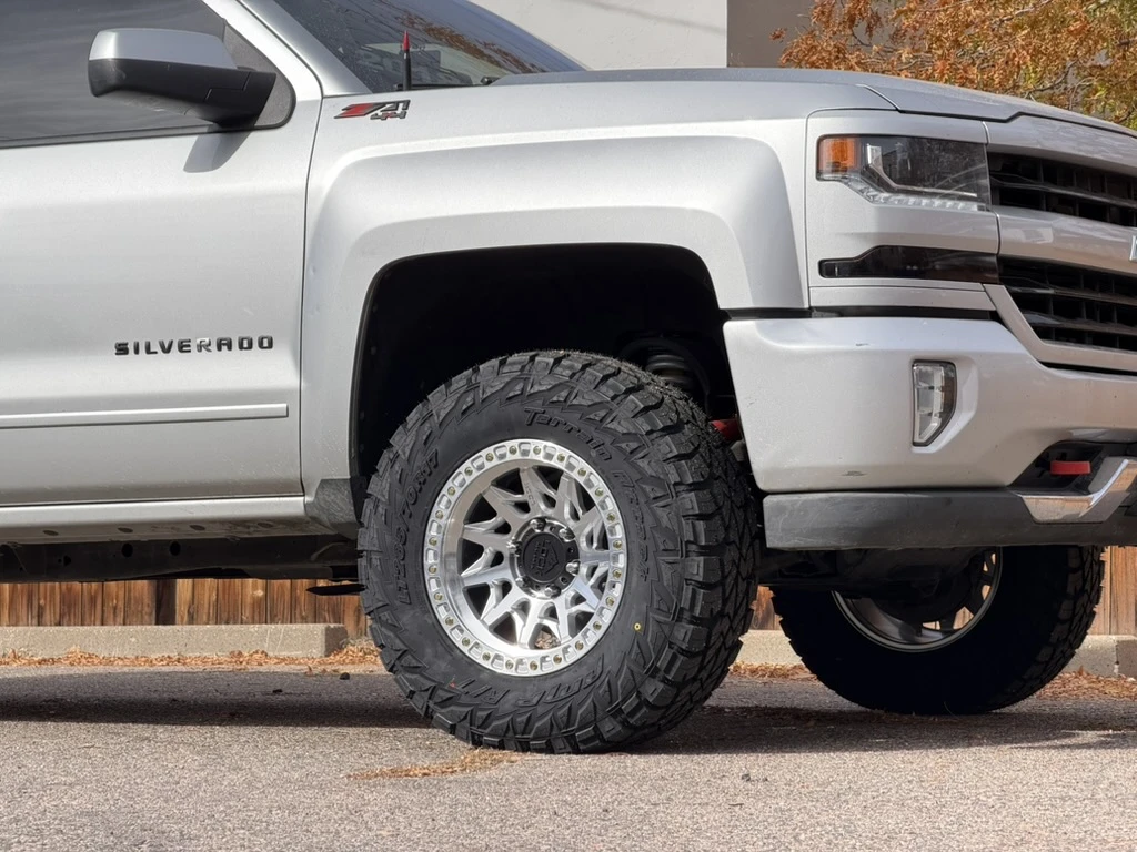 2017 Chevrolet Silverado 1500 with Lock Off-Road Lunatic Polished Silver Wheels