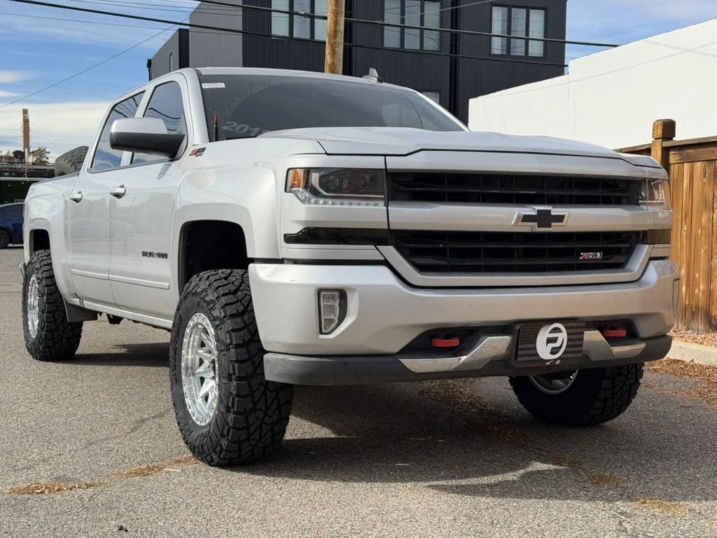 2017 Chevrolet Silverado 1500 with Lock Off-Road Lunatic Polished Silver Rims