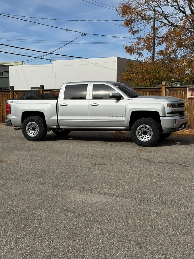 Polished Silver Lock Off-Road Lunatic on 2017 Chevrolet Silverado 1500