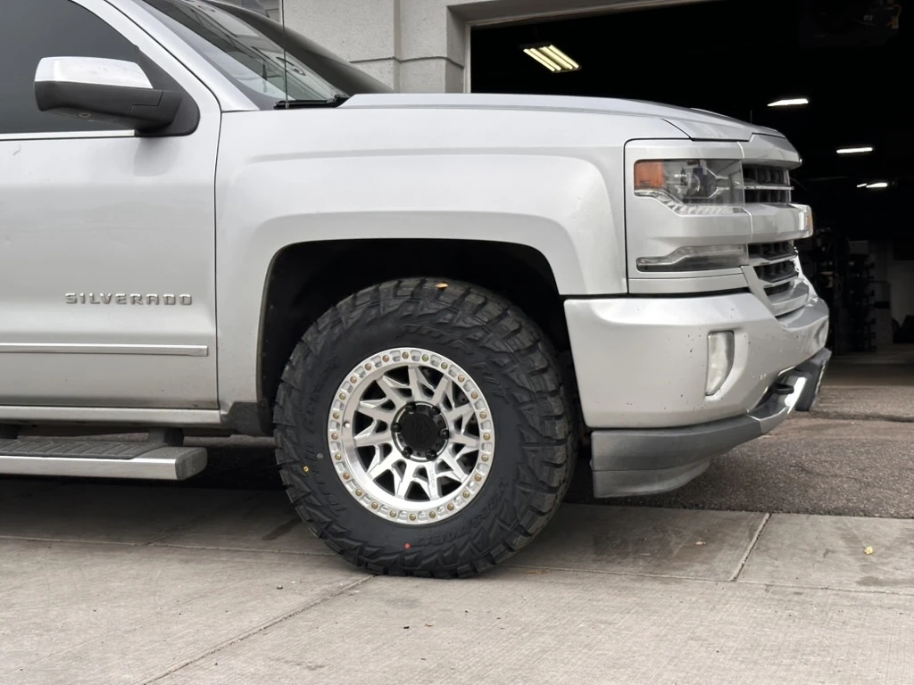 2018 Chevrolet Silverado 1500 with Lock Off-Road Lunatic Polished Silver Rims