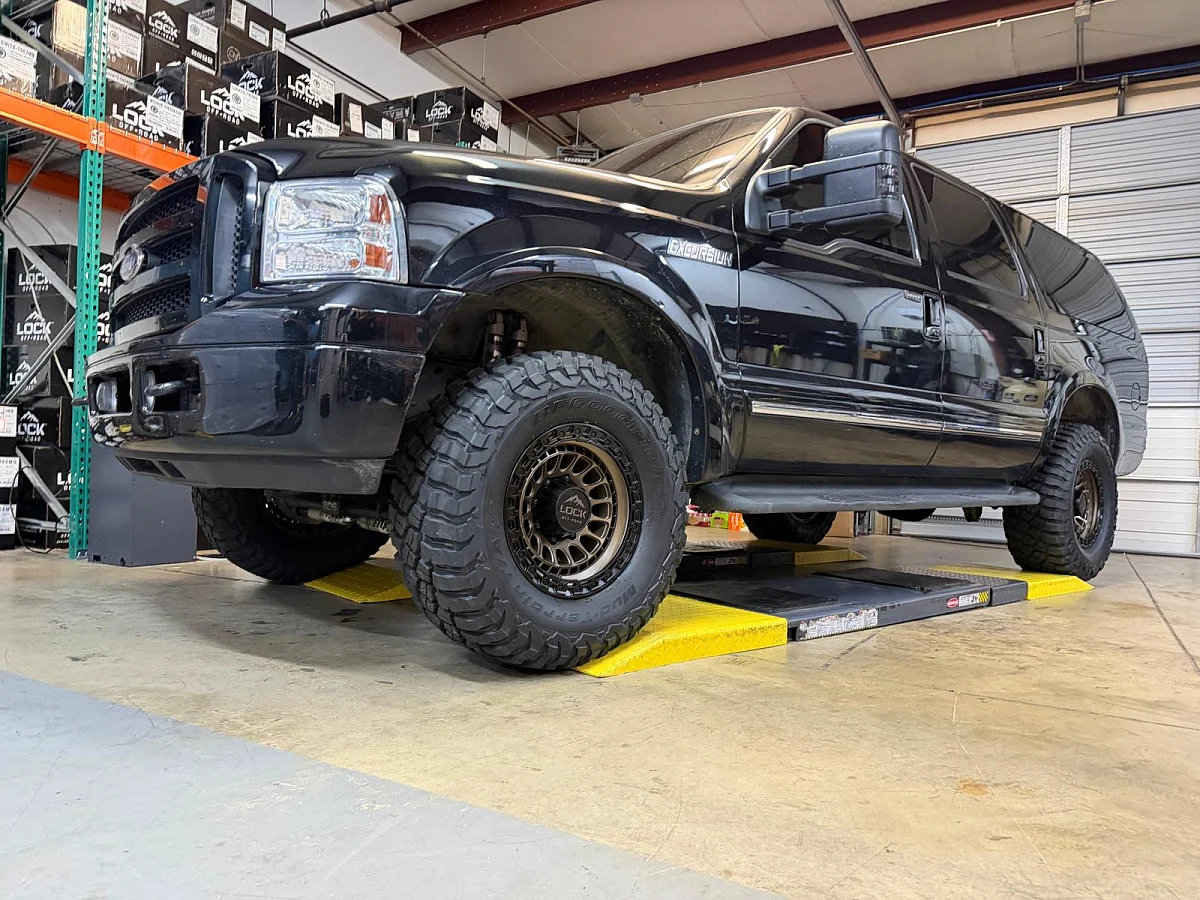 2005 Ford Excursion with Lock Off-Road Mojave Bronze Wheels