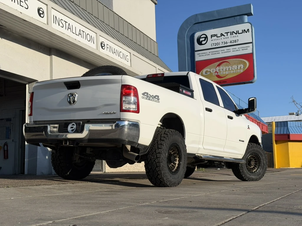 2023 RAM 2500 with Lock Off-Road Mojave Bronze Rims