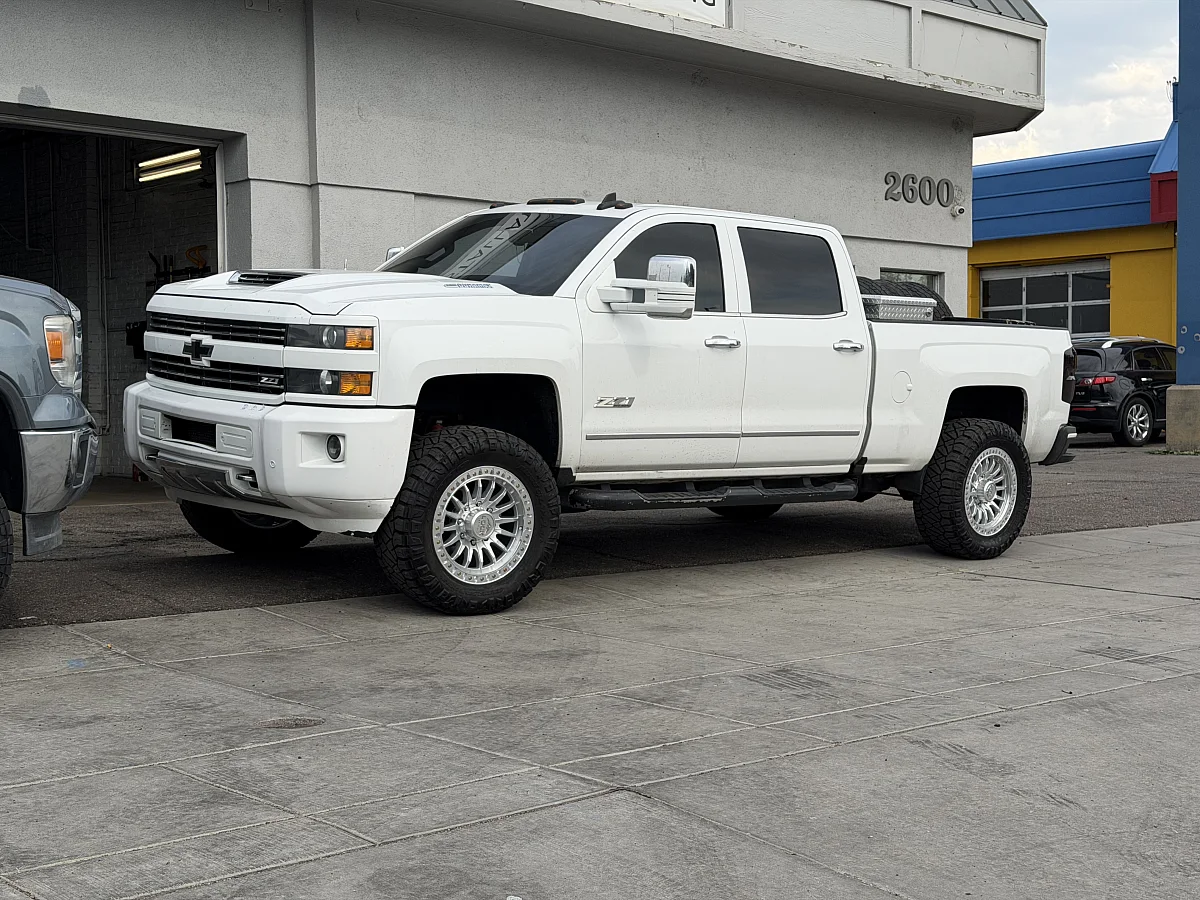 2016 Chevrolet Silverado 2500HD with Lock Off-Road Trail Machined Silver Wheels