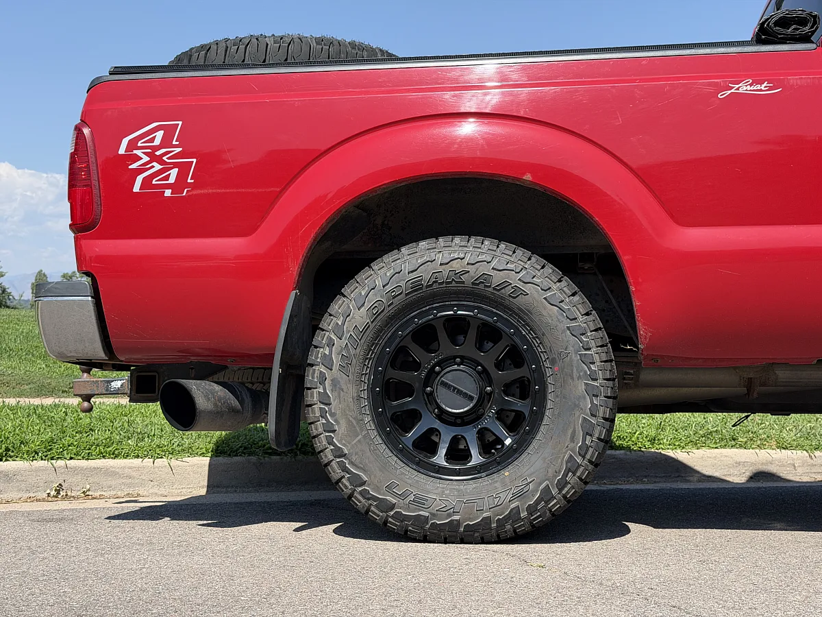 2012 Ford F-250 with Method MR709 Black Rims