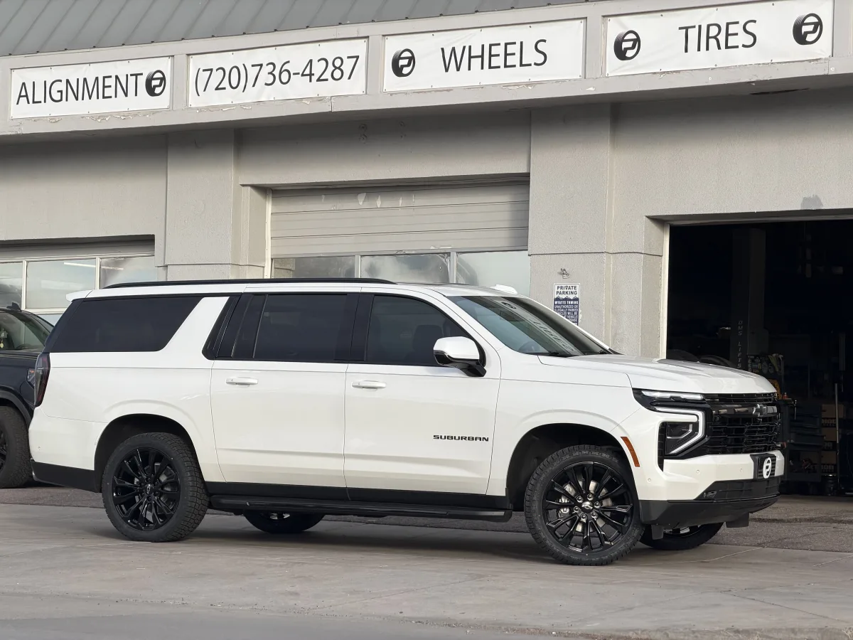 2024 Chevrolet Suburban Fitted with Black Replica Wheels 22" Denali 1107 Rims