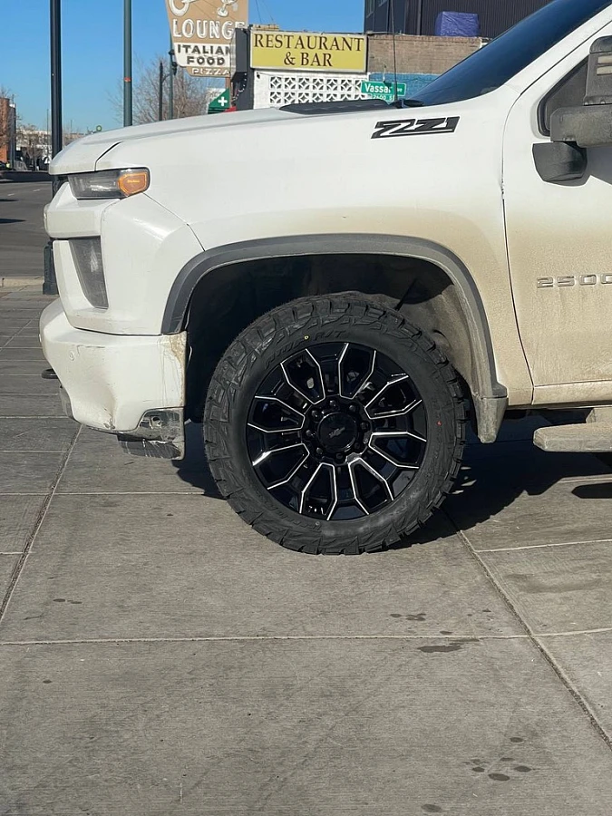 Replica Wheels 22" High Country 8x180mm Style 1140 Black and Milled on 2025 Chevrolet Silverado 2500HD