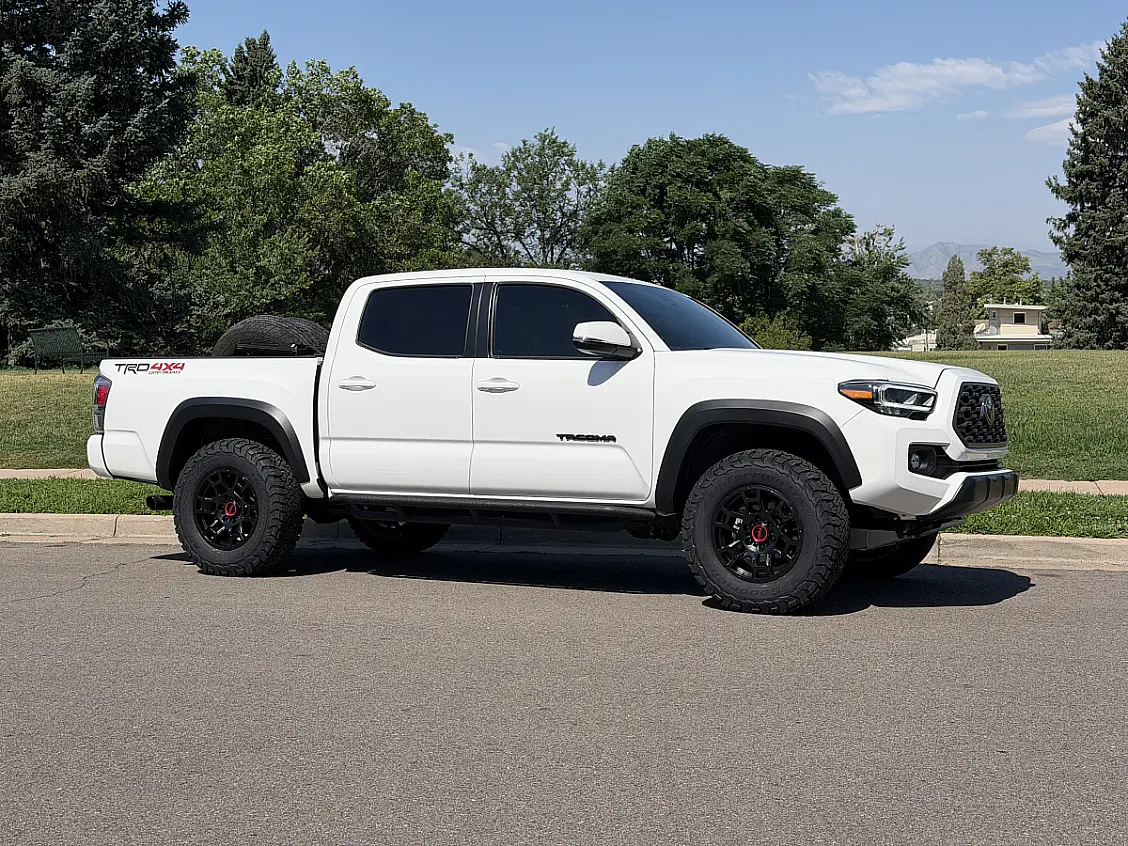 2023 Toyota Tacoma Fitted with Black Replica Wheels 17" TRD Pro 302 Rims