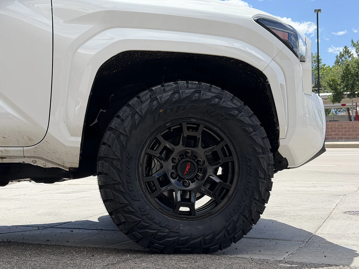 2025 Toyota Tacoma Fitted with Black Replica Wheels 17" TRD Pro 302 Rims