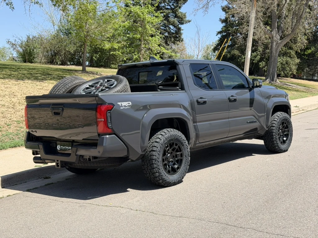 2026 Toyota Tacoma Fitted with Black Replica Wheels 17" TRD Pro 302 Rims