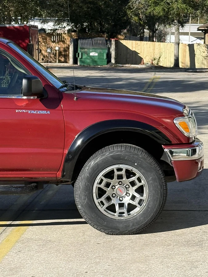Silver Replica Wheels 17" TRD Pro 302 on 2004 Toyota Tacoma