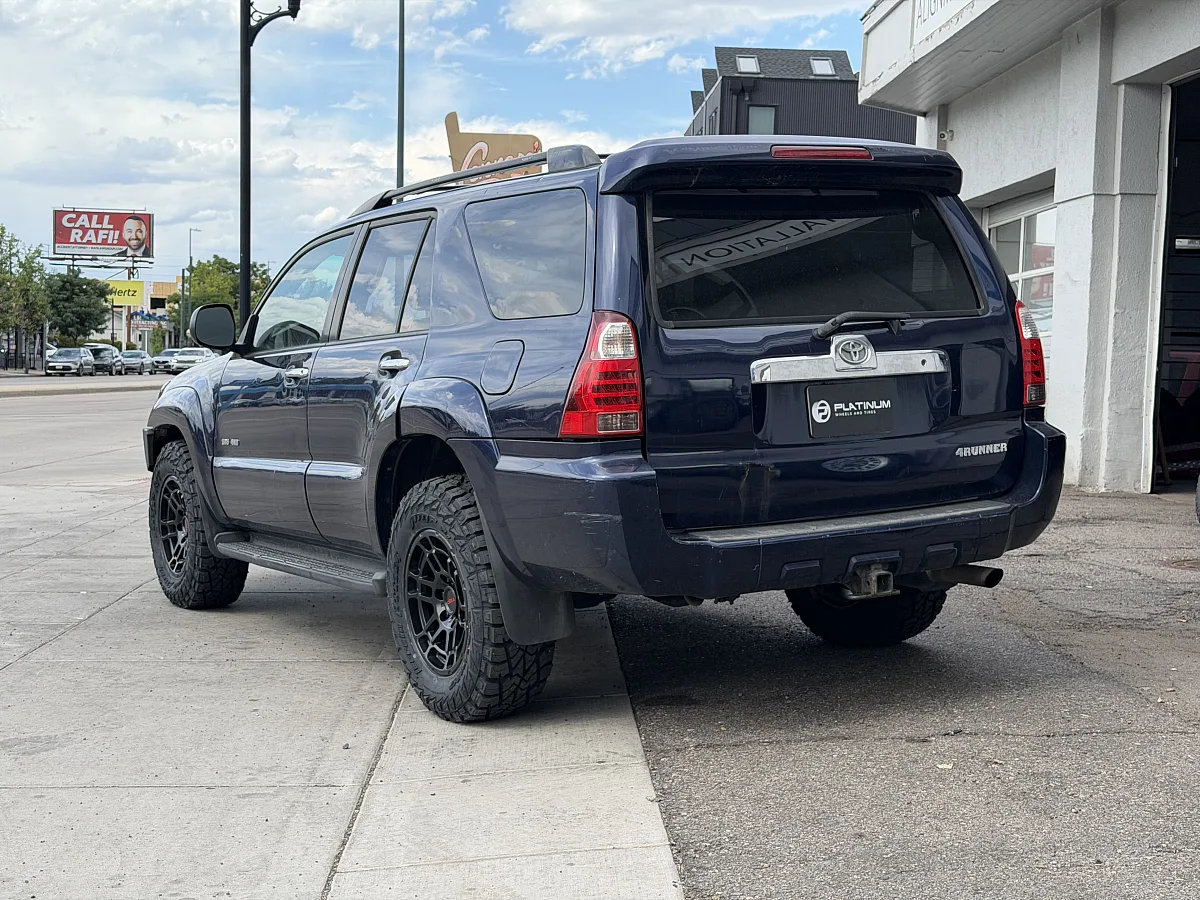 Replica Wheels 17" TRD Pro 305 Black Rim on 2007 Toyota 4Runner