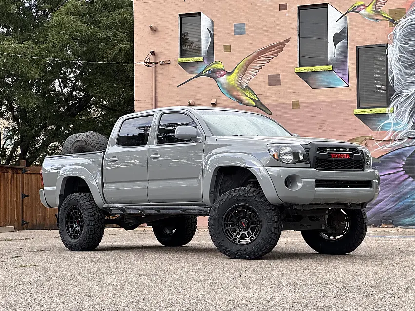 Black Replica Wheels 17" TRD Pro 305 on 2014 Toyota Tacoma