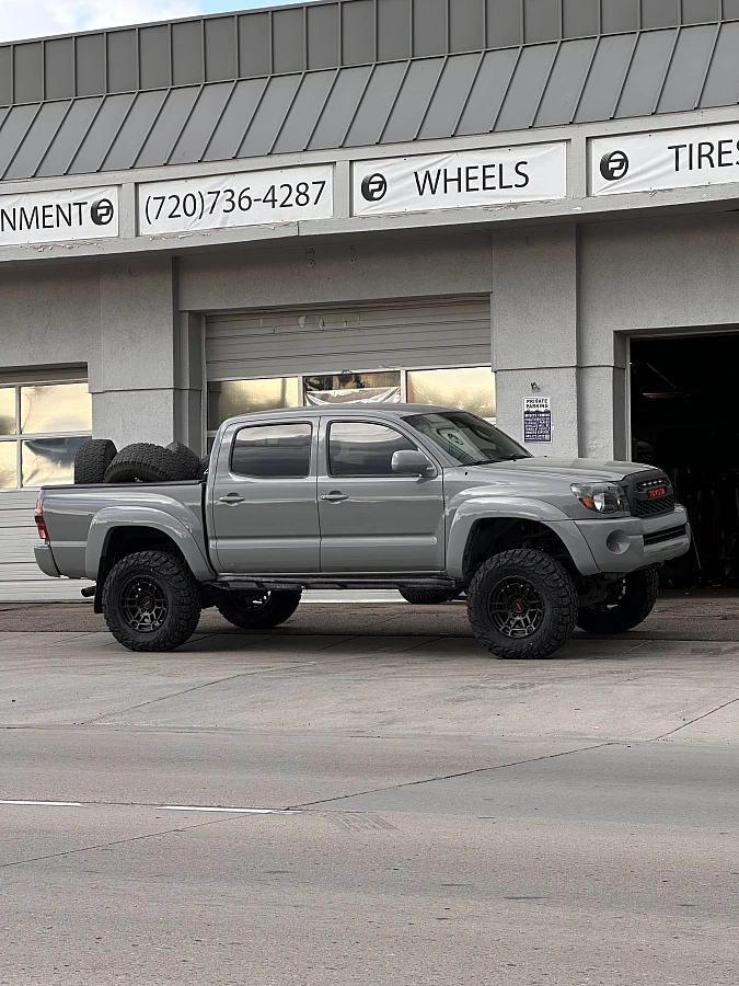 Replica Wheels 17" TRD Pro 305 Black Aftermarket Wheel on 2014 Toyota Tacoma