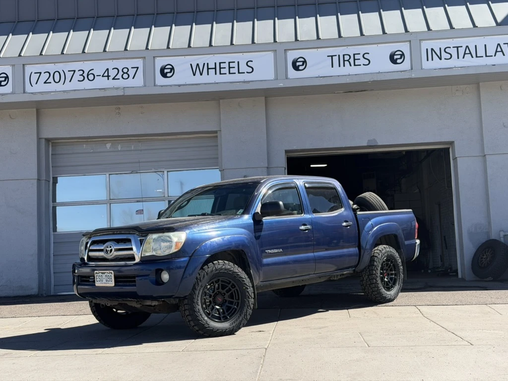 Black Replica Wheels 17" TRD Pro 305 on 2015 Toyota Tacoma