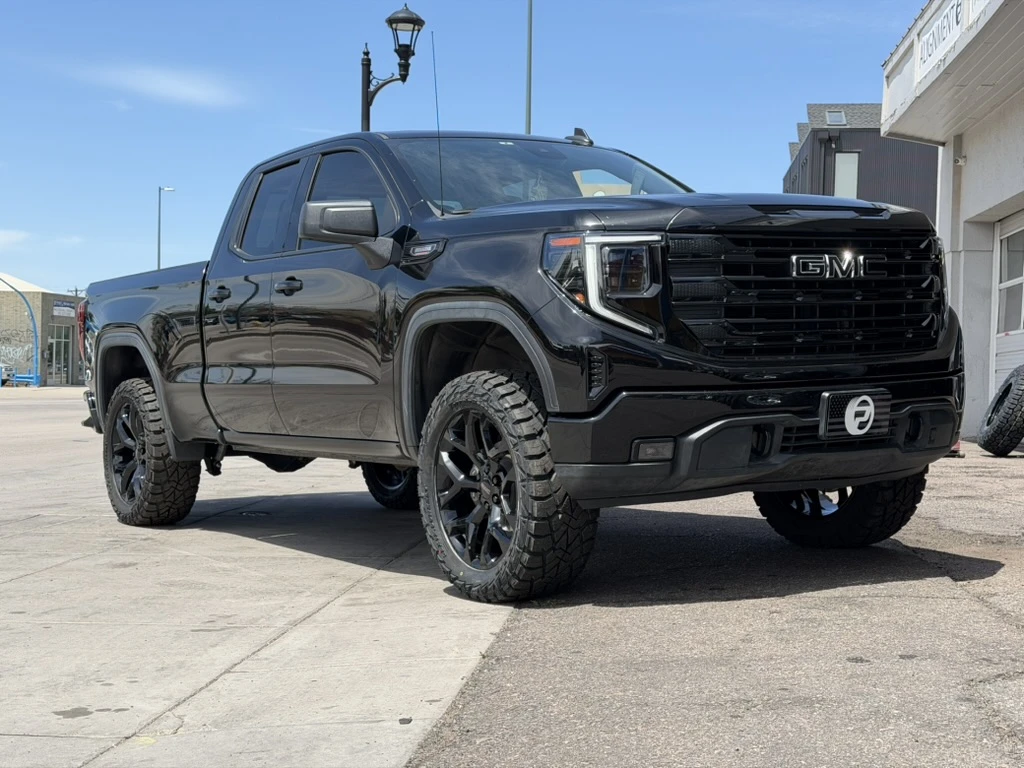 Replica Wheels 22" Snowflake Style 1101 Black Aftermarket Wheel on 2025 GMC Sierra 1500